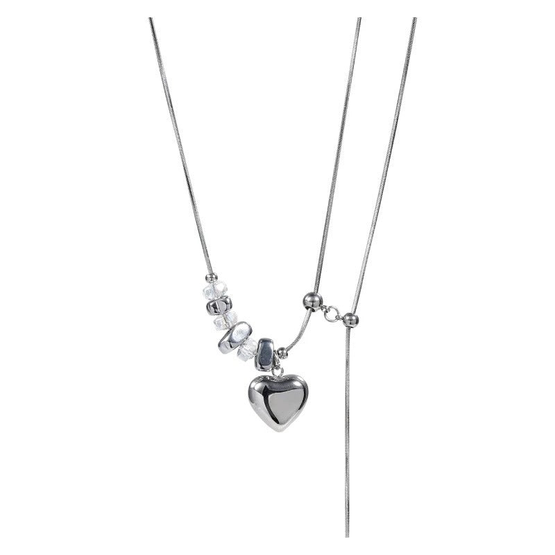 Damen Halskette mit glänzendem Herzanhänger und edlen Kristallelementen Shop Nory