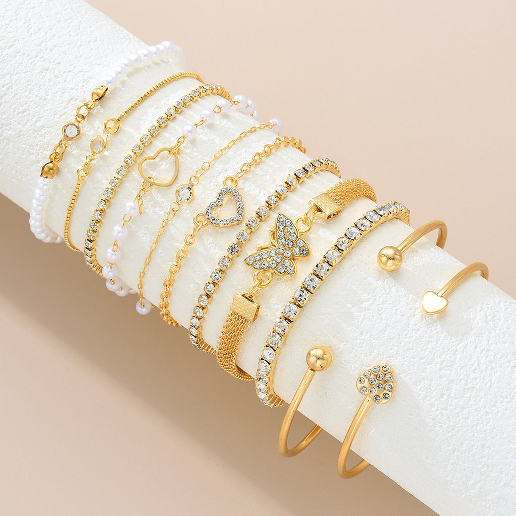 Damen Armband-Set mit funkelnden Kristallen und reizvollen Herzanhängern Shop Nory