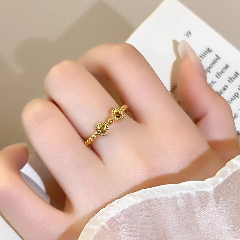Damen filigraner Ring mit herzförmigem Design und kreativen Akzenten Shop Nory