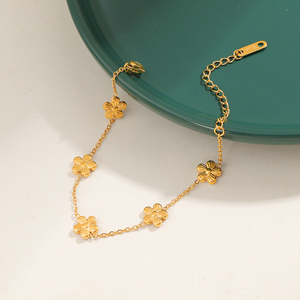 Damen zierliches Armband mit floralen Anhängern Shop Nory