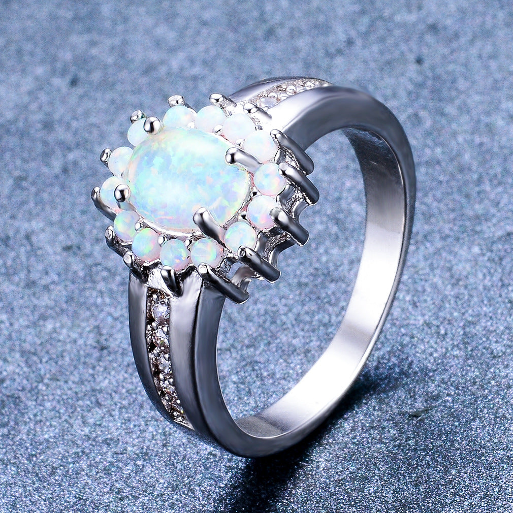 Damen Ring mit funkelndem Opal und floraler Zirkonia-Verzierung Shop Nory