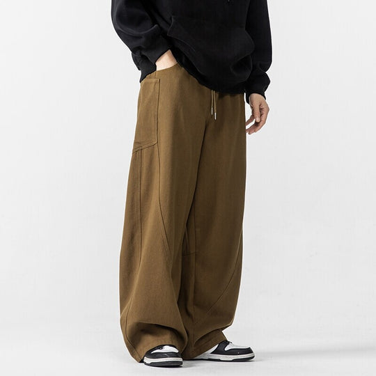 Herren Weite Loungehose mit Tunnelzug, aufgesetzten Taschen und markanten Panelnähten Shop Nory