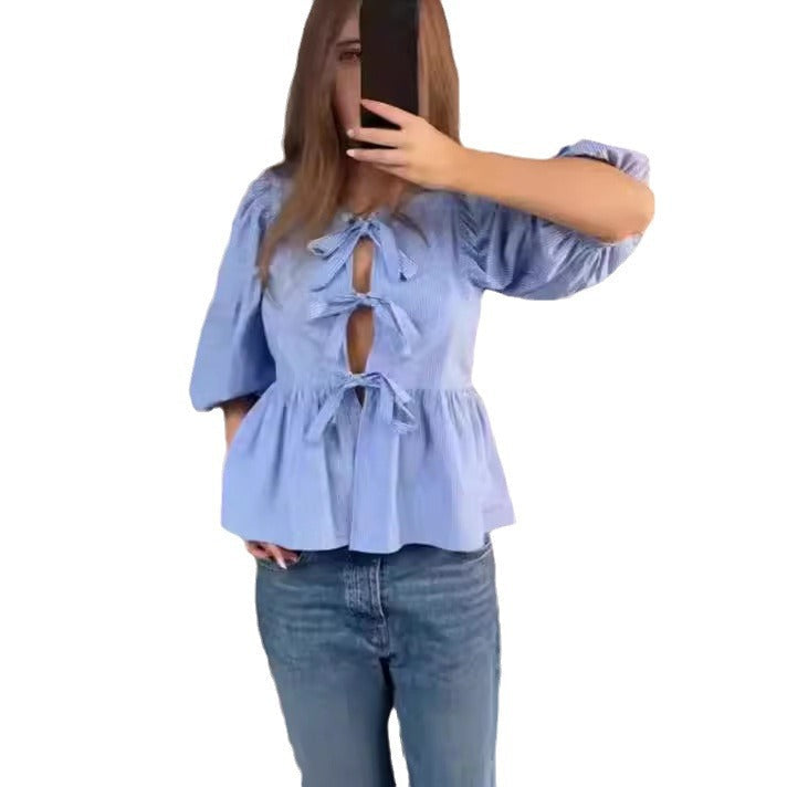 Damen Bluse mit raffinierten Schleifen und voluminösen Ärmeln
