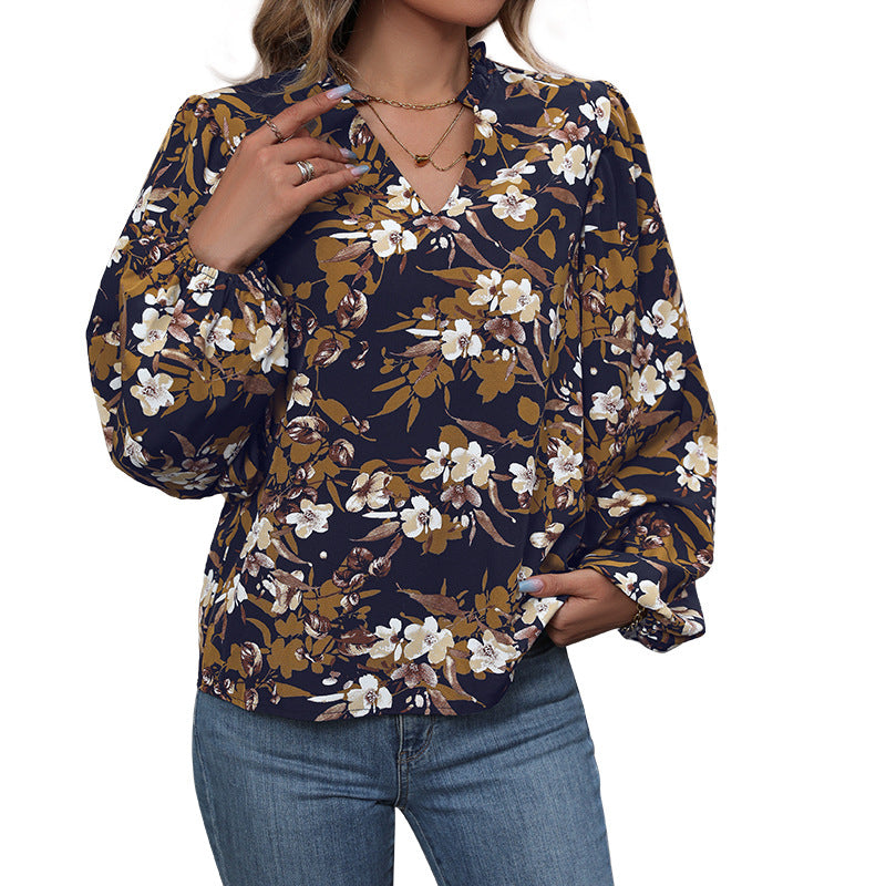Damen Leichte Chiffonbluse mit floralem Alloverprint, V-Ausschnitt und voluminösen Bündelärmeln Shop Nory