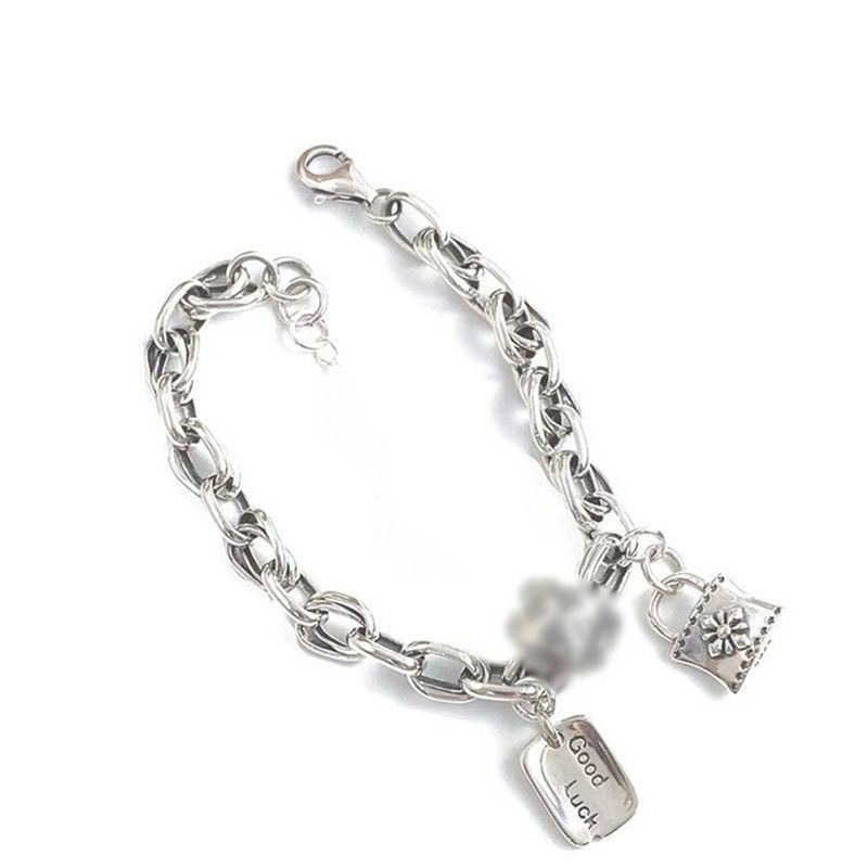 Damenarmband mit kunstvollem Anhänger und edlen Details Shop Nory