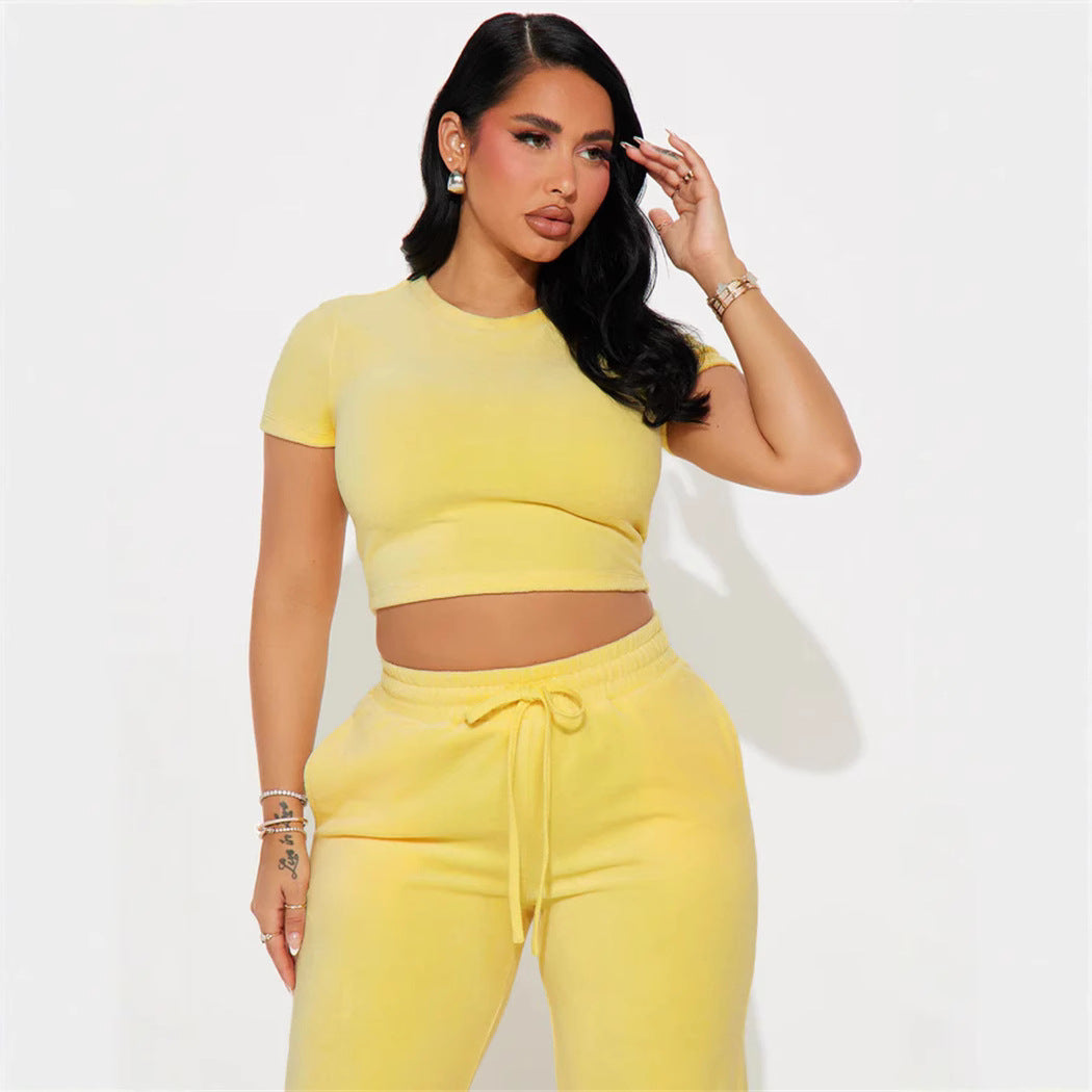 Damen Velours-Hausanzug mit bauchfreiem Shirt und weit geschnittener taillenhoher Jogginghose Shop Nory