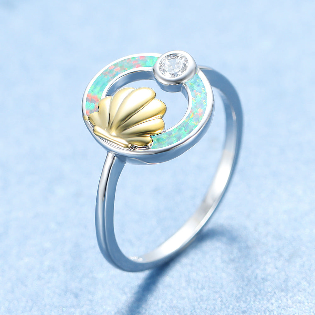 Damen Ring mit stilvollem Muschel-Design und schimmerndem Opal Shop Nory