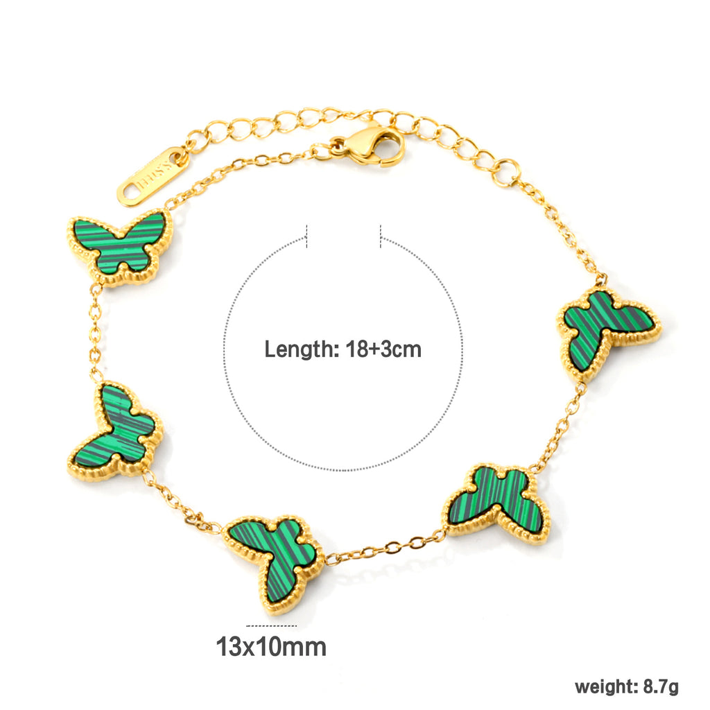 Damen Armband mit bunten Schmetterlingsanhängern und hochwertiger Goldbeschichtung Shop Nory