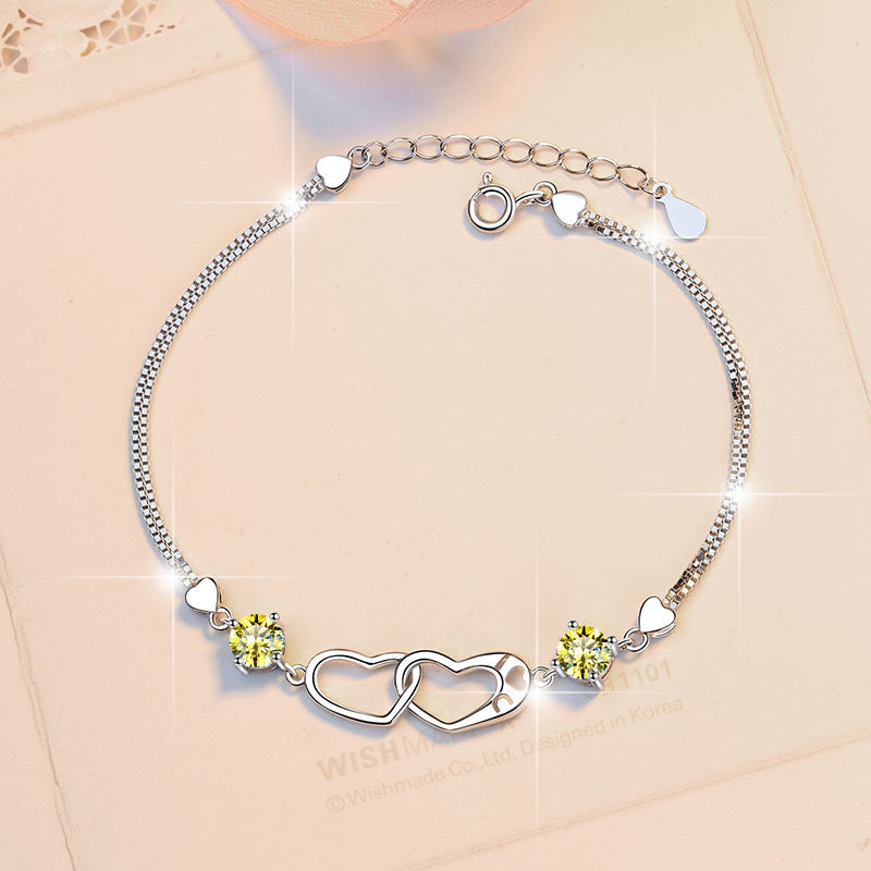 Damenarmband mit elegantem Herzdesign und funkelnden Zirkonia Shop Nory