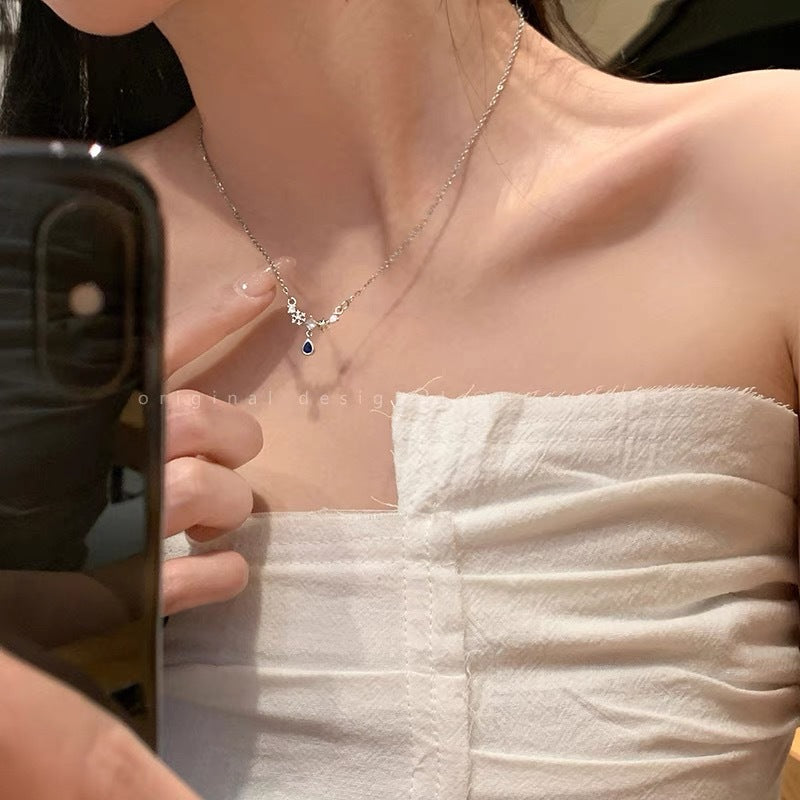 Damen Halskette mit funkelnden Zirkonia und Tropfenanhänger Shop Nory