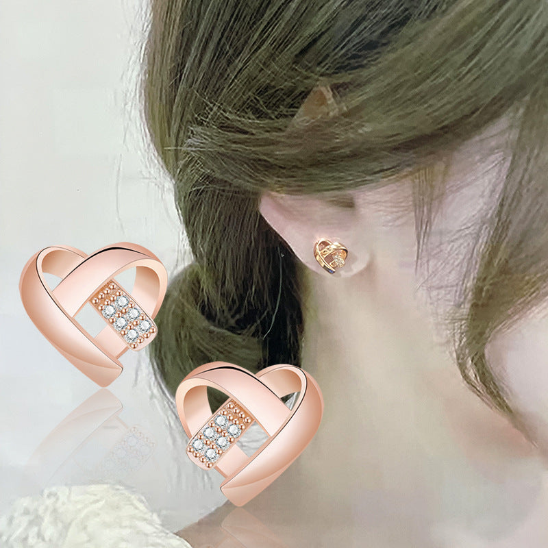 Damen Ohrstecker in Herzform mit funkelnden Zirkonia Shop Nory