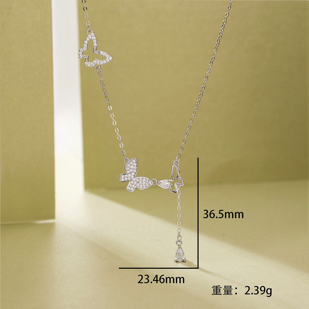 Damen Halskette mit filigranem Schmetterlingsdesign und funkelnden Zirkoniasteinen Shop Nory