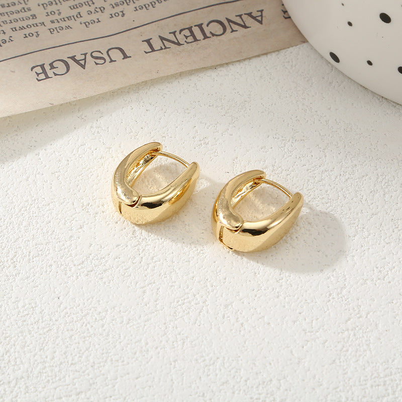 Damen Creolen mit elegantem geschwungenen Design Shop Nory