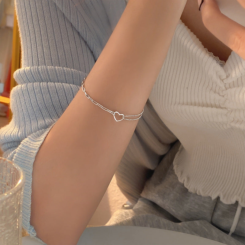 Damen zartes Armband mit verschnörkeltem Herzdesign Shop Nory