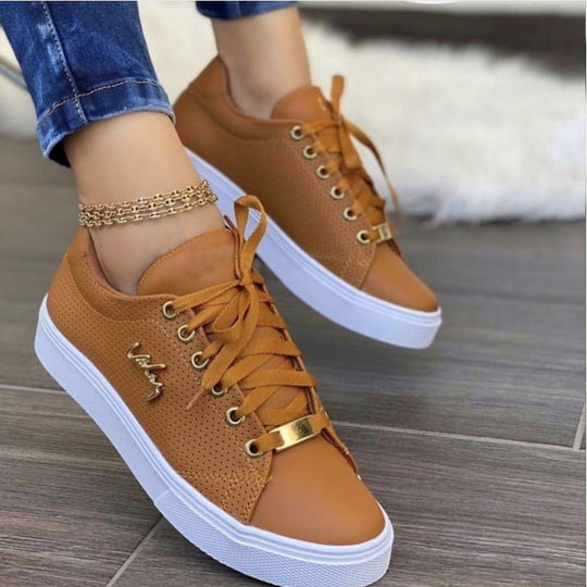 Damen Freizeitsneaker mit atmungsaktivem Obermaterial und modischen Zierelementen