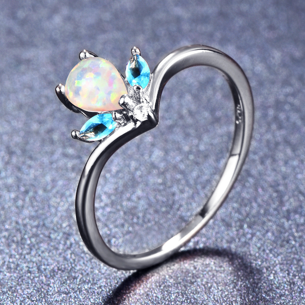 Damen Ring mit elegantem tropfenförmigem Opal und funkelnden Zirkonia Shop Nory