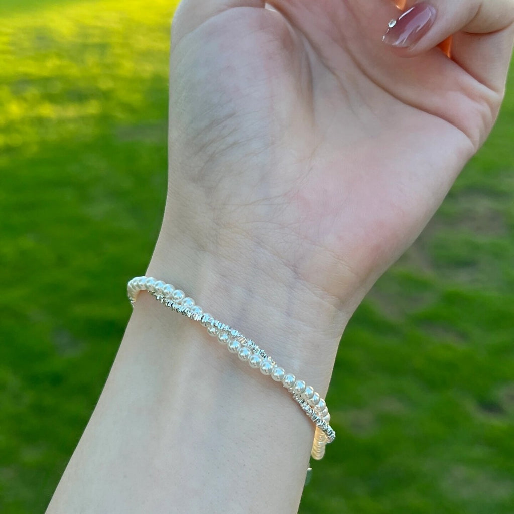 Damen Elegantes Armband mit schimmernden Perlen und funkelnden Akzenten Shop Nory