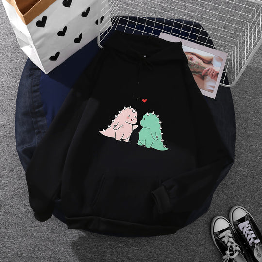 Damen nan Kapuzenpullover mit niedlicher Dinosaurierpärchen‑Illustration, Oversize‑Schnitt und Kängurutasche Shop Nory