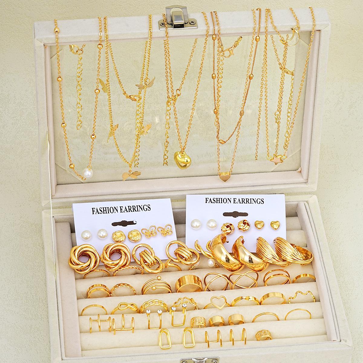 Damen Schmuckset mit mehrlagigen Ketten und vielfältigen Ringen Shop Nory