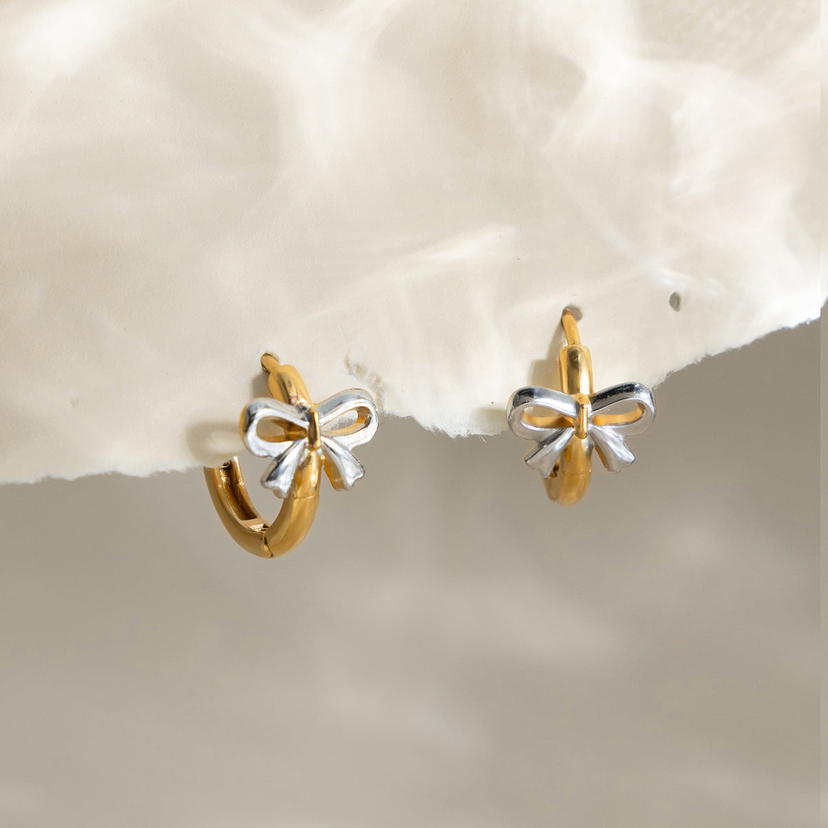 Damen Creolen mit Schleifenmotiv aus hypoallergenem Edelstahl Shop Nory