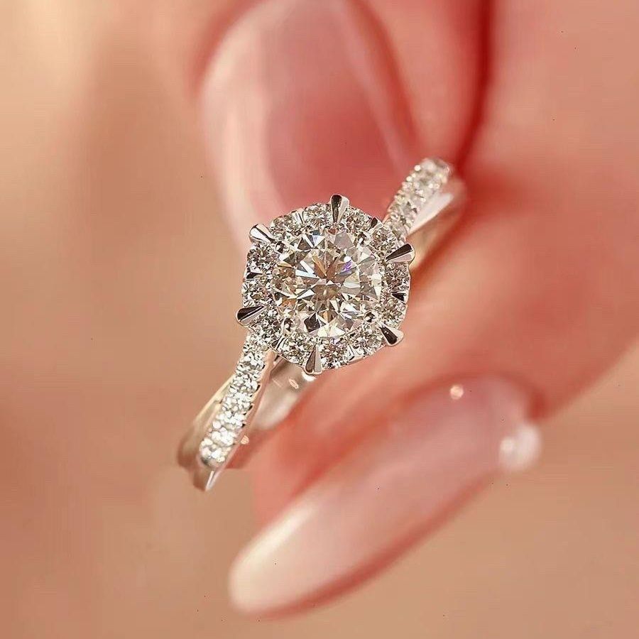Damen eleganter Solitärring mit funkelndem Zirkonia und filigraner Fassung Shop Nory
