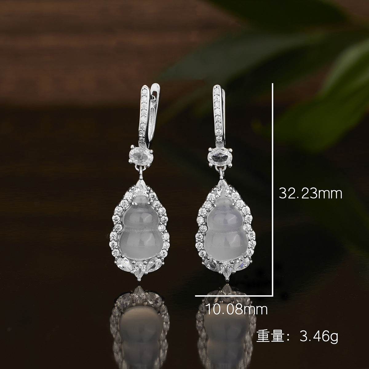 Damen elegante Ohrringe mit kunstvollem Design und funkelnden Zirkonia Shop Nory