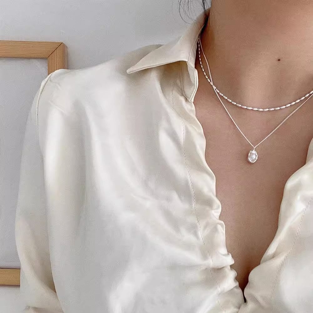 Damen Halskette mit hochwertigem Perlenanhänger und modernem Silberdesign Shop Nory