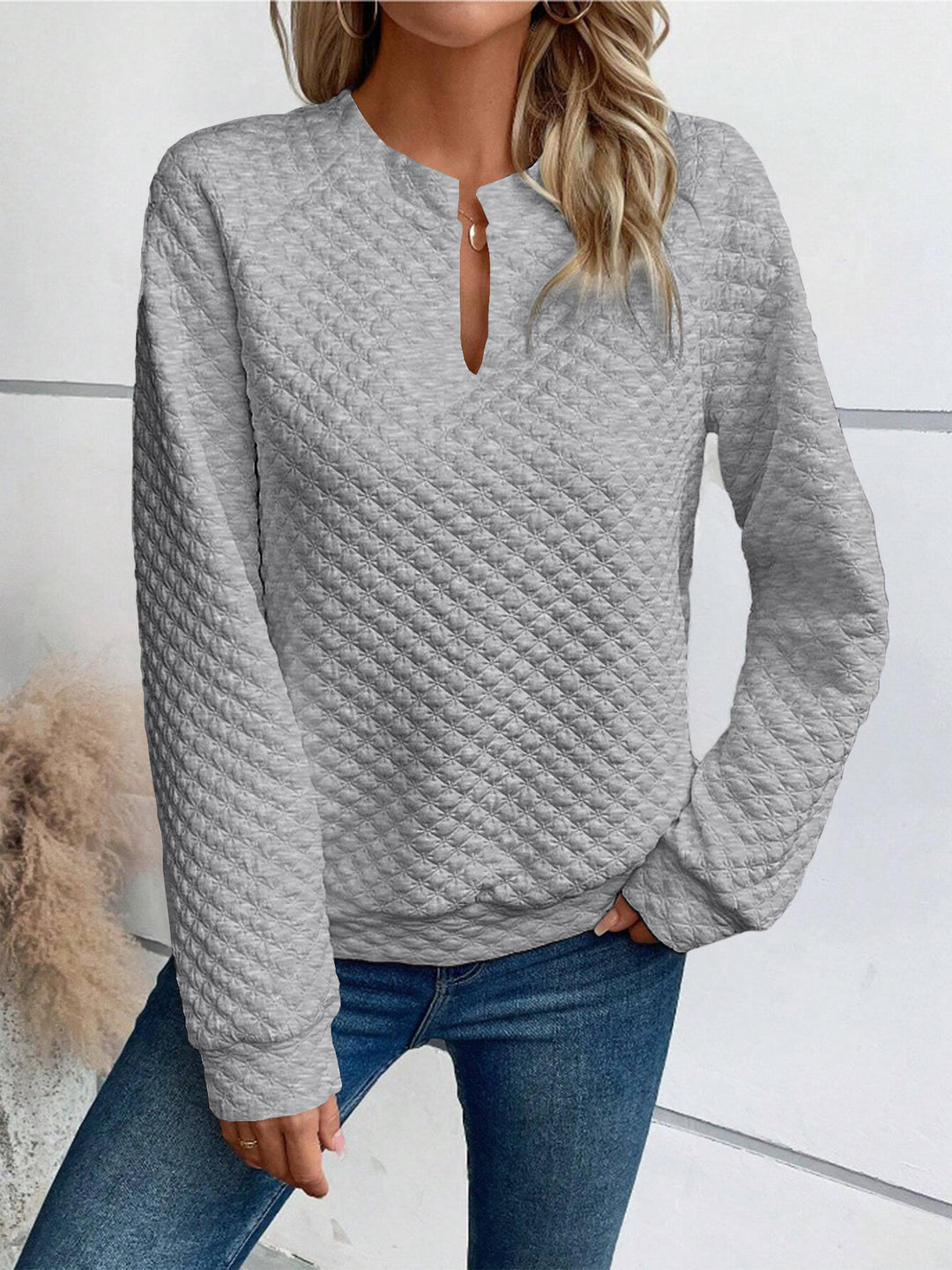 Damen Gestepptes Sweatshirt mit Schlitzkragen, Rautenstruktur und Raglanärmeln Shop Nory