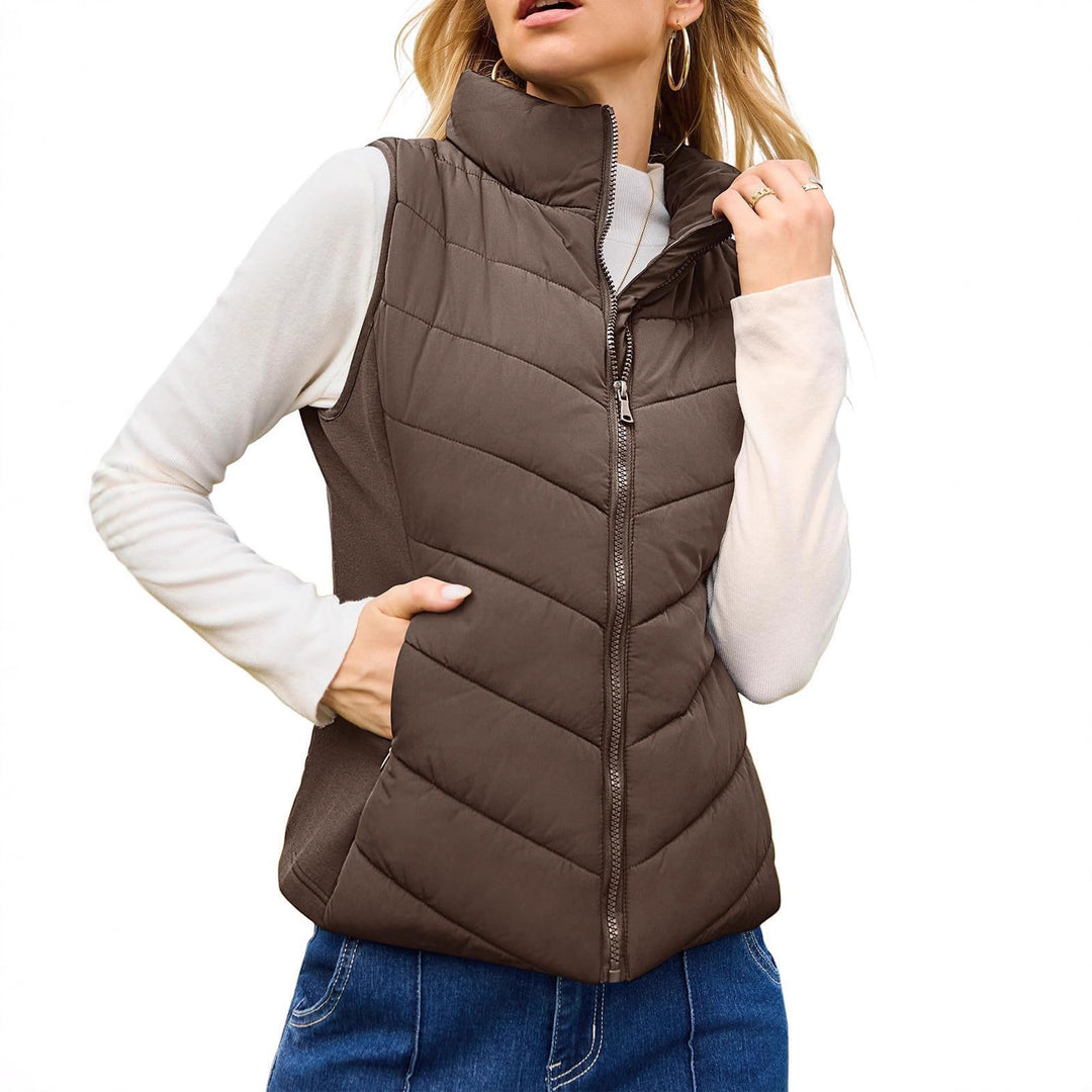 Damen Steppweste mit hohem Stehkragen und figurbetonten Stretchseiten Shop Nory