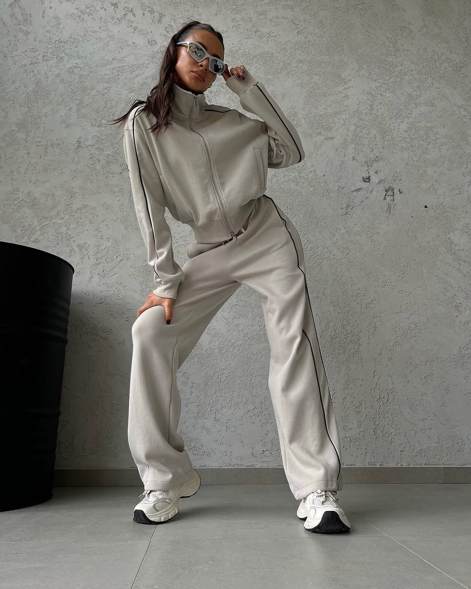 Damen lässiges Sweatset mit Stehkragen Reißverschluss gekürzter Jacke und hochtaillierter Schlaghose Shop Nory