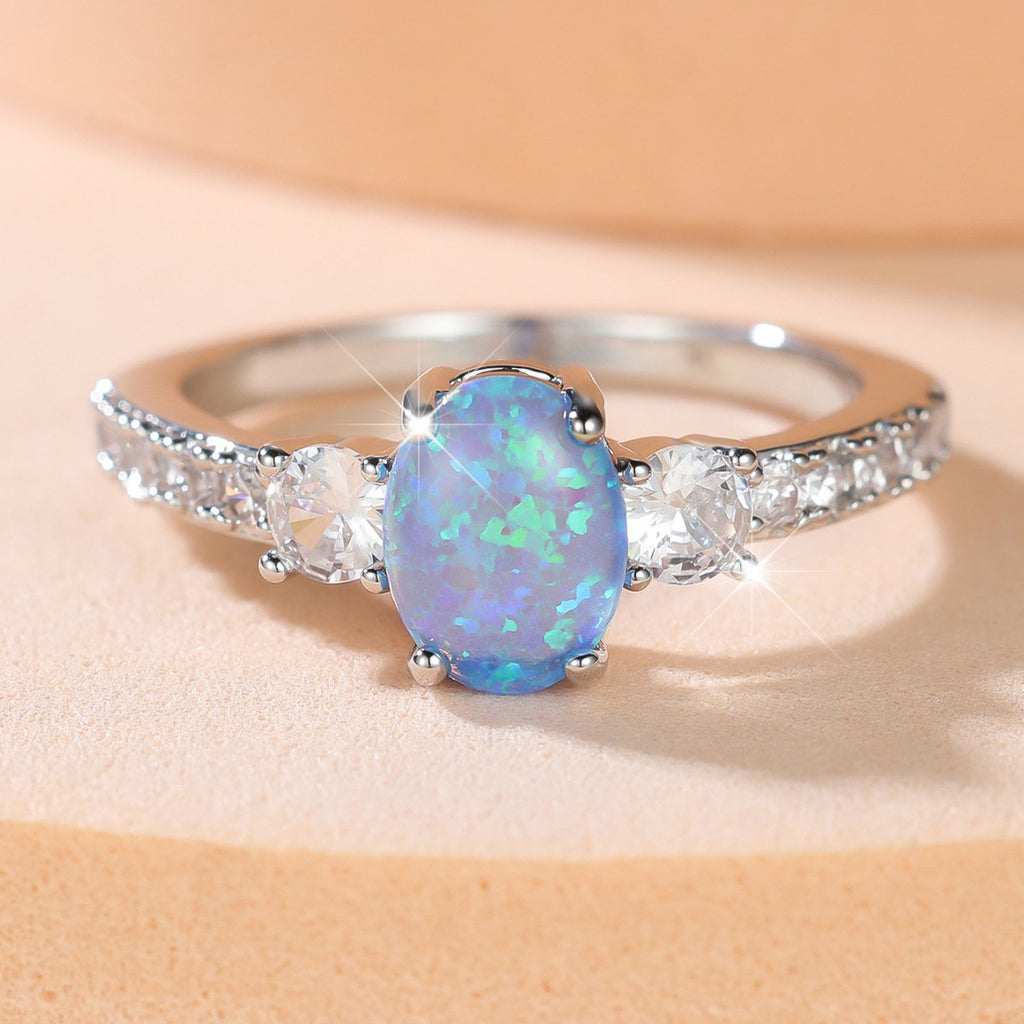 Damen Ring mit funkelndem Opal und zarten Zirkonia-Details Shop Nory