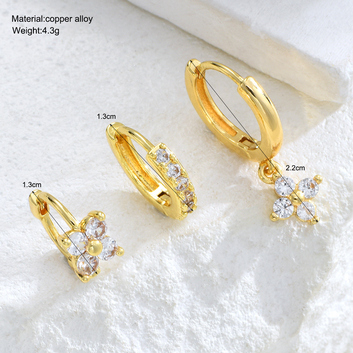 Damen Ohrstecker-Set mit funkelnden Kristallen und floralem Design Shop Nory