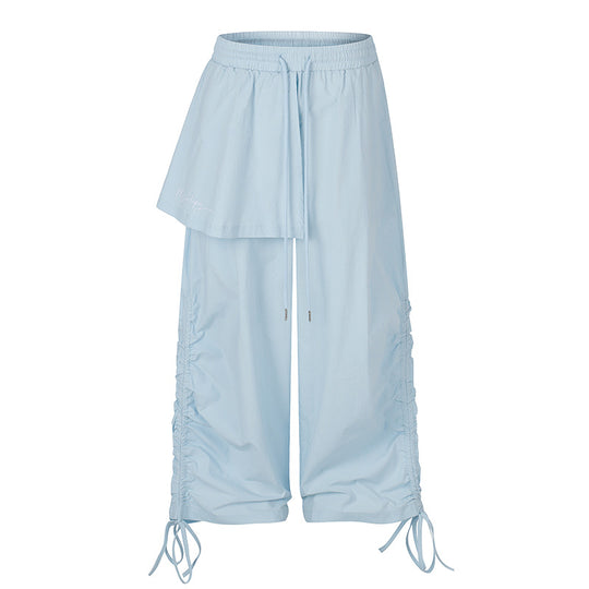 Damen Weite Capri-Hose mit Tunnelzug, seitlicher Raffung und asymmetrischer Überlagerung Shop Nory