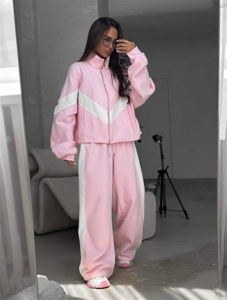 Damen eleganter sportlicher Zweiteiler Trainingsanzug mit Reißverschluss und kontrastierender V-Passe Shop Nory