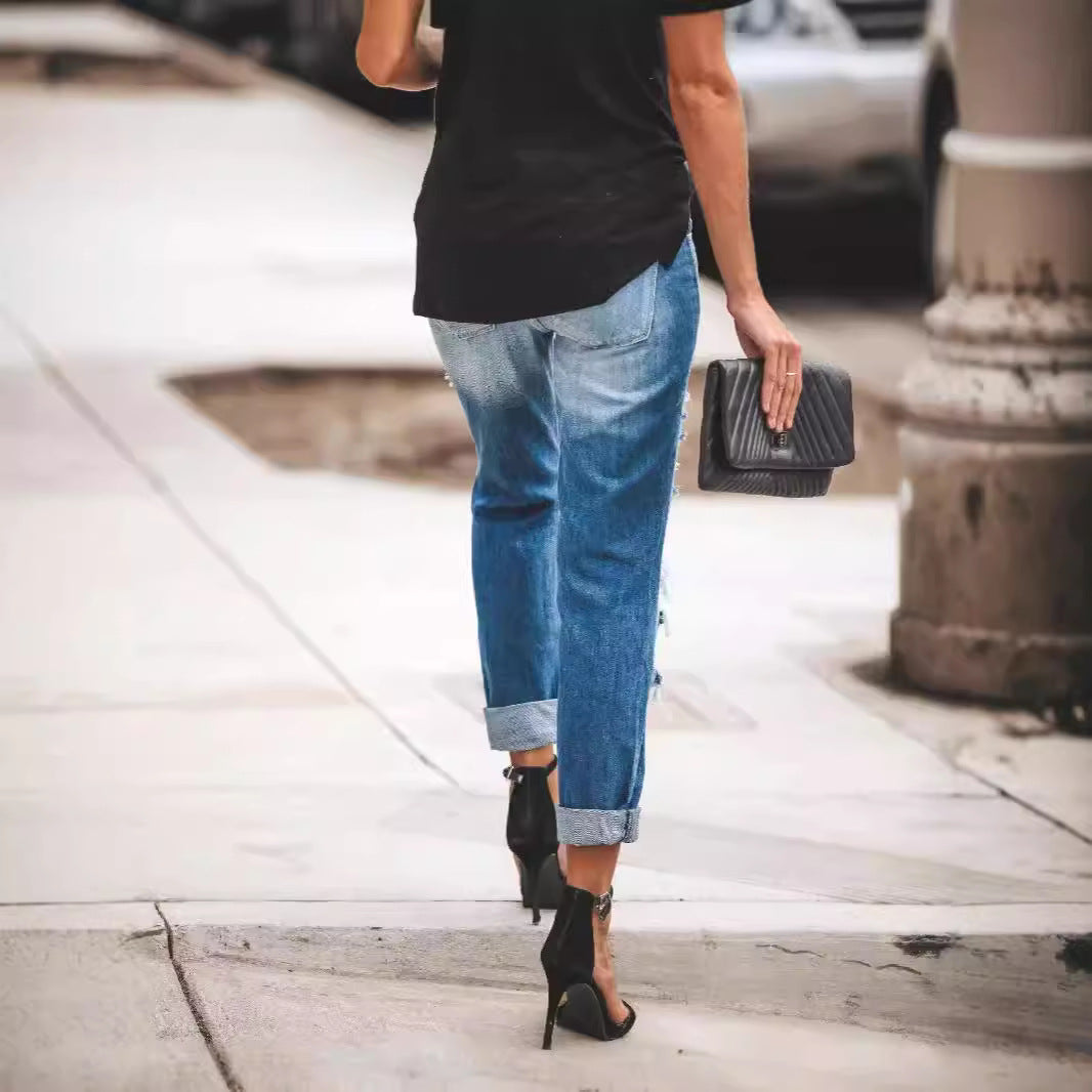 Damen Ripped Boyfriend Jeans mit lässigem Schnitt und fransigen Elementen