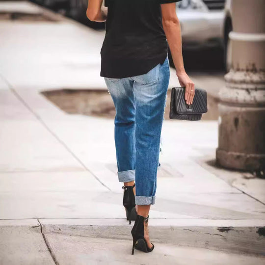 Damen Ripped Boyfriend Jeans mit lässigem Schnitt und fransigen Elementen