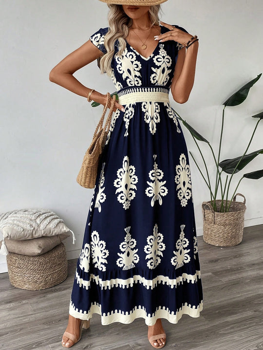 Damen Boho-Langkleid mit V‑Ausschnitt, tailliertem Stretch-Bund und kontrastierendem Ornamentdruck Shop Nory