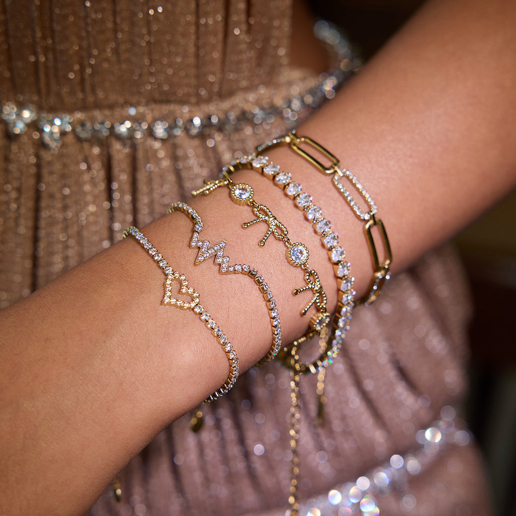 Damen Armband mit funkelnden Kristallen und elegantem Muschel-Design Shop Nory