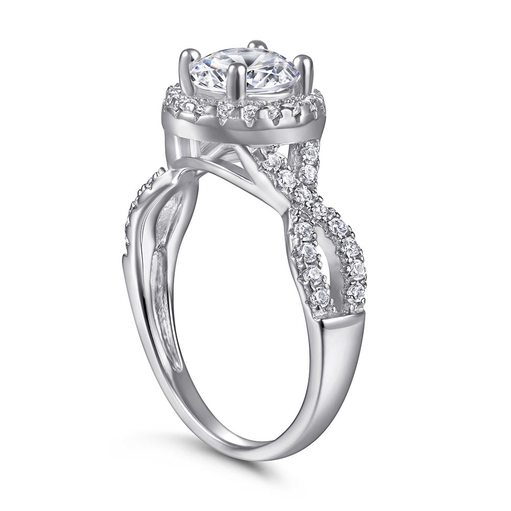 Damen Ring mit funkelndem Solitär und kunstvollem Zirkonbesatz Shop Nory