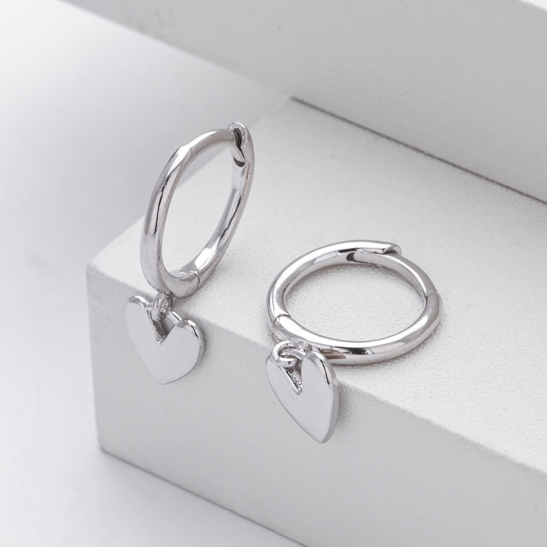 Damen Creolen mit herzförmigem Anhänger aus 925 Sterling Silber Shop Nory
