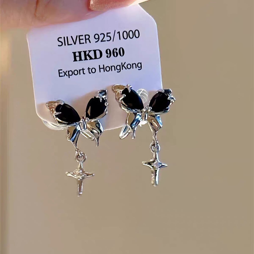 Damen Ohrhänger im eleganten Schmetterlingsdesign mit funkelnden Akzenten Shop Nory