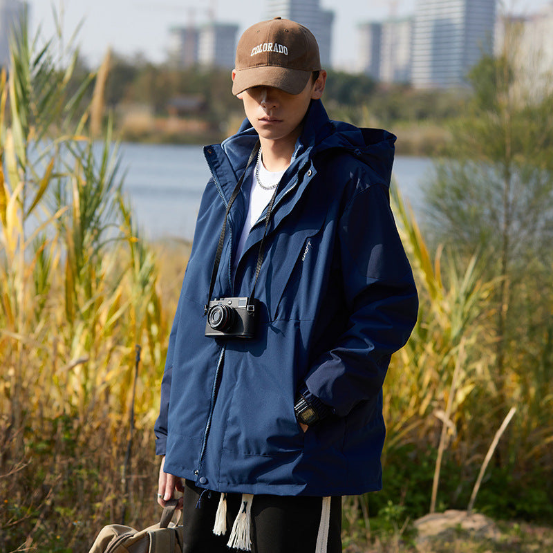 Damen zweilagige wasserabweisende Outdoorjacke mit Kapuze, Taillenregulierung und Kontrastbesätzen Shop Nory