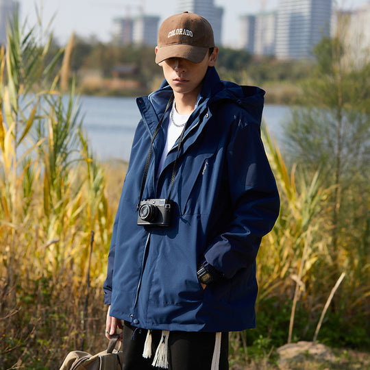 Damen zweilagige wasserabweisende Outdoorjacke mit Kapuze, Taillenregulierung und Kontrastbesätzen Shop Nory