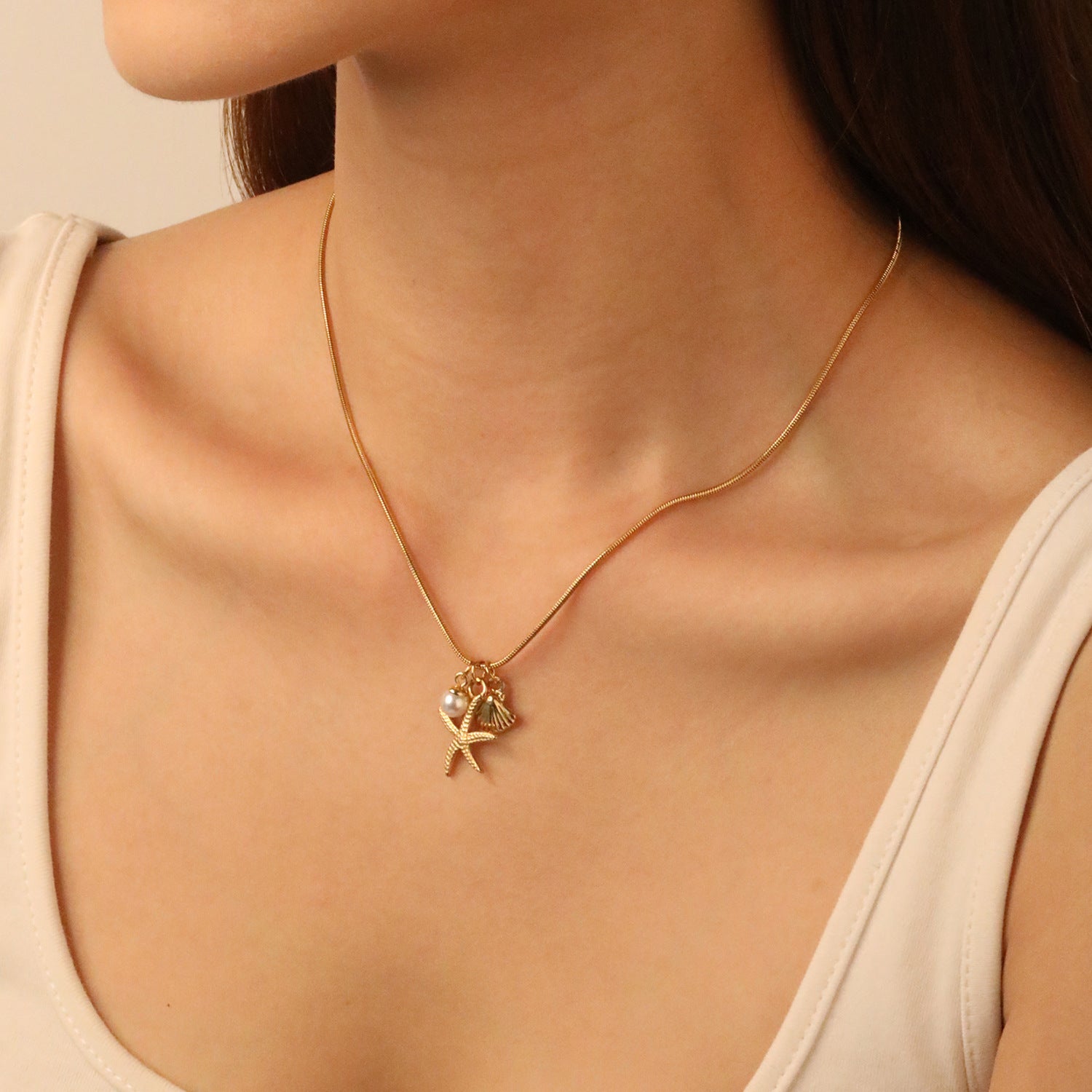 Damen Halskette mit maritimem Muschel- und Seestern-Anhänger Shop Nory