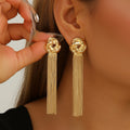 Damen Hängende Ohrringe mit eleganten Quasten und geschwungenem Design Shop Nory