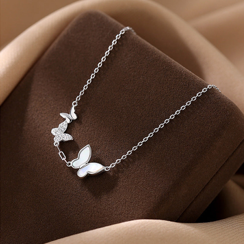 Damenarmband mit filigranem Schmetterlingsdesign und funkelnden Zirkonia Shop Nory