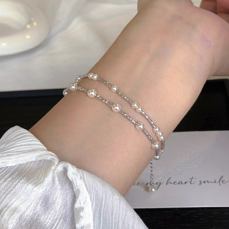 Damen Perlenarmband mit funkelnden Zirkonia Shop Nory