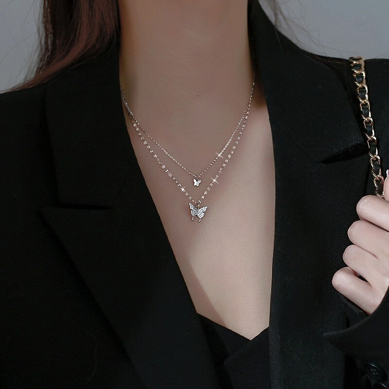 Damen Halskette mit funkelndem Schmetterlingsanhänger Shop Nory