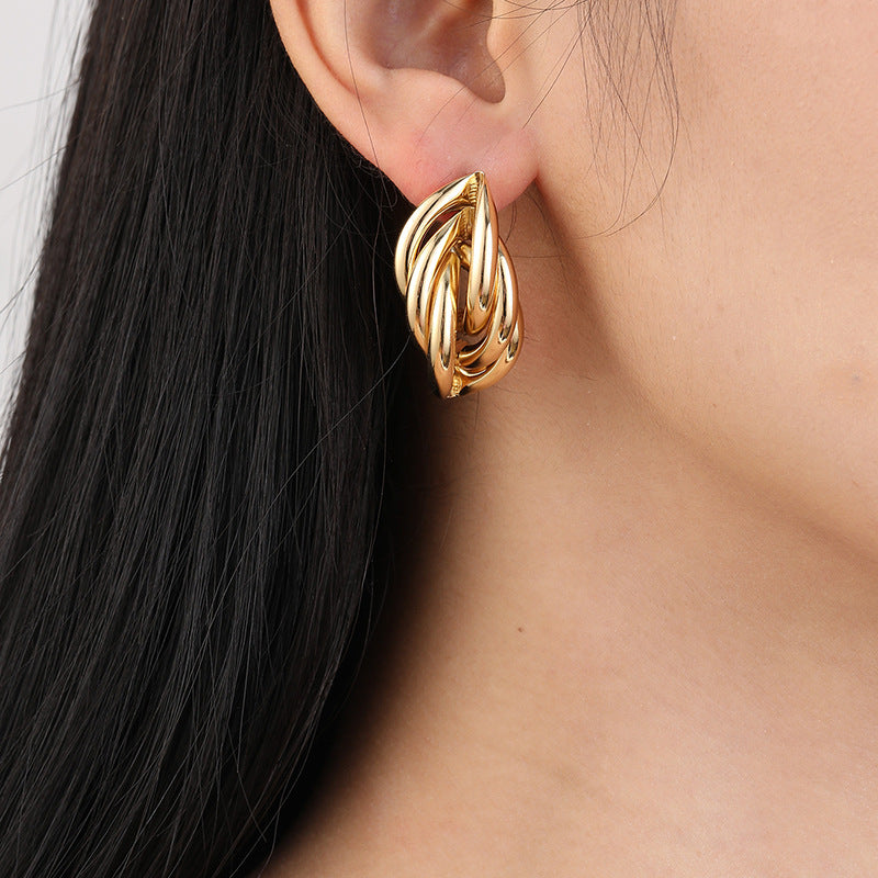 Damen Ohrringe mit elegantem gedrehten Design Shop Nory