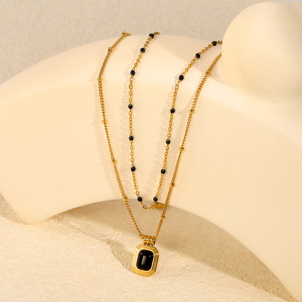 Damen Halskette mit kunstvollem Bogen-Anhänger aus hochwertigem Edelstahl Shop Nory